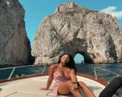 She is fond of traveling and traveled to many places in the world.